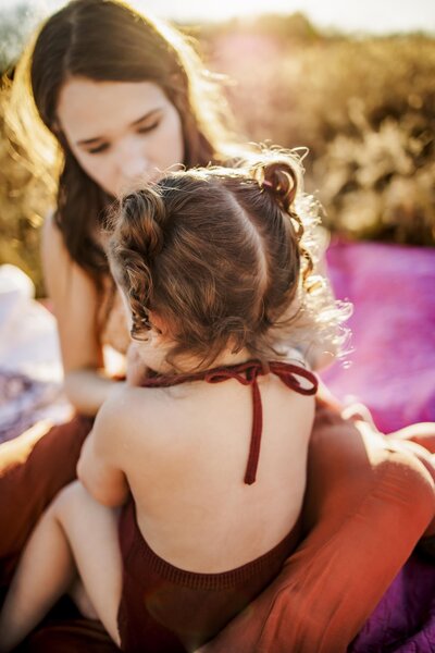 a mom and her toddler daughter outside in McKinney texas