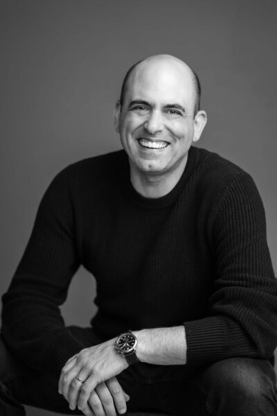 Stephen Mayo, founder of Heritage House and NYC wedding photographer, pictured in a professional portrait.