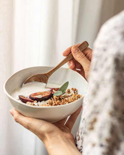 woman eating breakfast
