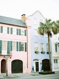 Pastel Southern city architecture with palm trees in Charleston, inspiring refined estate weddings and timeless Southern garden style