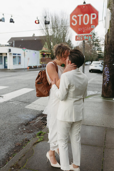Two women embrace before their intimate wedding at Fairweather restaurant in Portland, Oregon. 