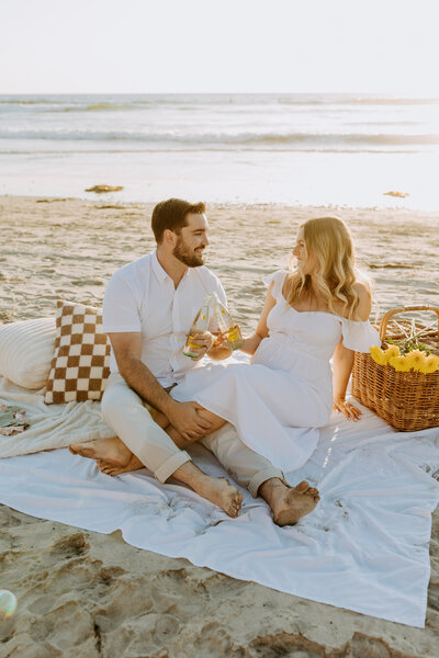 Natural Candid Documentary Family Maternity Baby Pregnancy Announcement Photo shoot at La Jolla Windansea beach at sunset - Couples Mom and Dad San Diego Maternity Photographer
