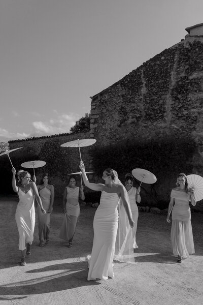 Newly we couple pose for a photography at there sunny luxury wedding ceremony in the south of France