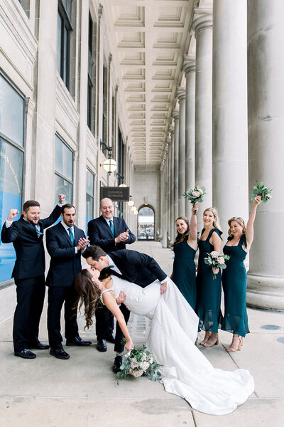 wedding image of chicago groom dipping bride
