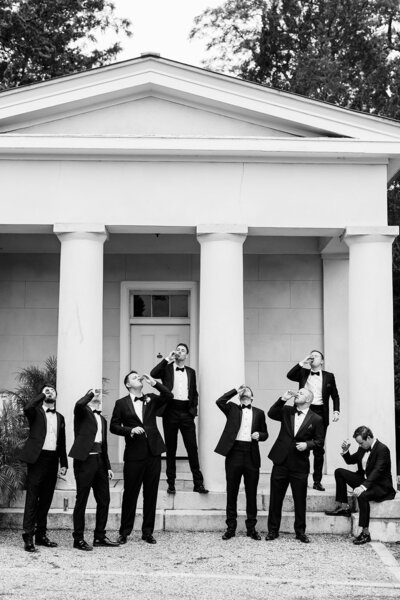 An asheville wedding photographer captures a close up of a bride resting on her groom's shoulder