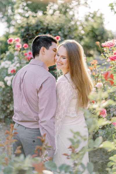 a bride and groom walk and laugh together at their cornerstone gardens wedding in sonoma, ca