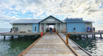 sarasota florida locals enjoy owens fish camp restaurant in burns court.