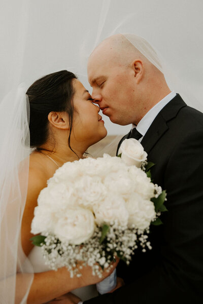Bride and Groom Portrait with White Bouquet