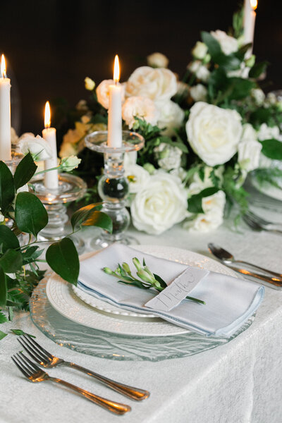 Close-up of elegant wedding reception table décor at the Rosewood Mansion in Dallas.
