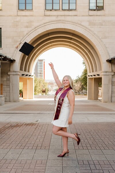 Texas State grad portraits at the arch