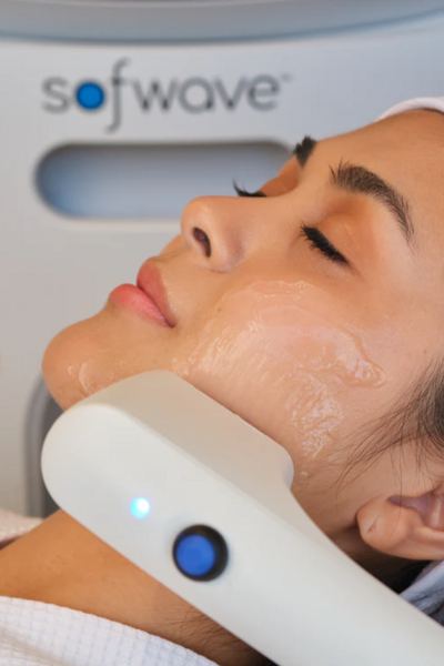 Young asian woman getting luxury pampering during her Sofwave treatment.