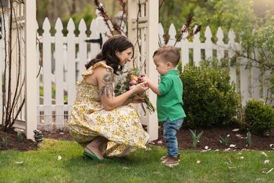 A sweet moment at Mother's Day mini sessions between mom and son