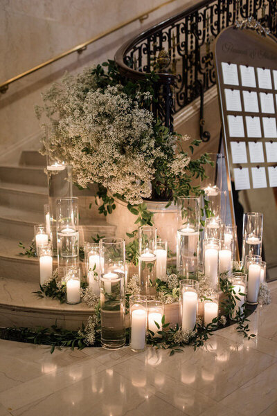 Wedding reception decor with candles and flowers, taken by Detroit wedding photographer Courtney Rudicel