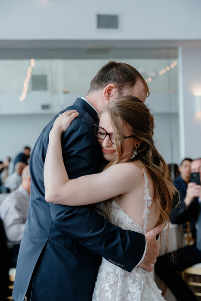 A groom dipping a bride