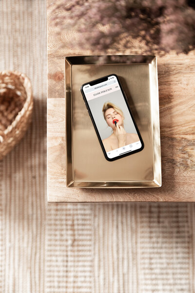 iPhone mock up on gold tray
