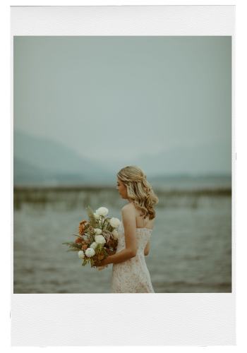 Wedding Venue Polaroid Photo with a bride holding a bouquet on the beach