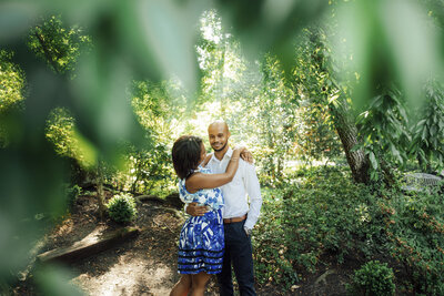 Sayen House & Gardens | Couple embracing during spring engagement photo | Hamilton Township, New Jersey