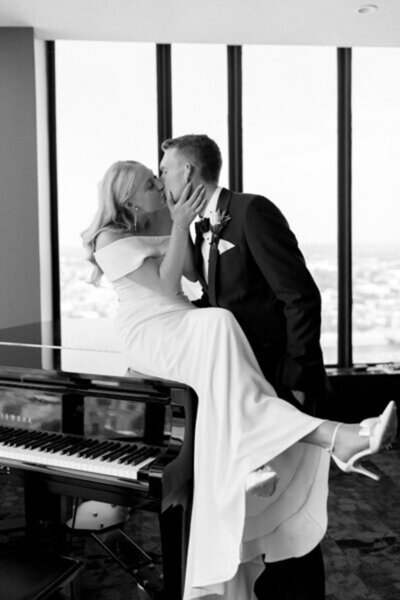 Black and white of bride and groom kissing, by orlando wedding photographer Marissa Nicole