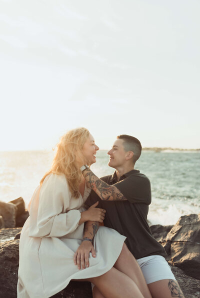 young married couple enjoying sunset on destin florida beach