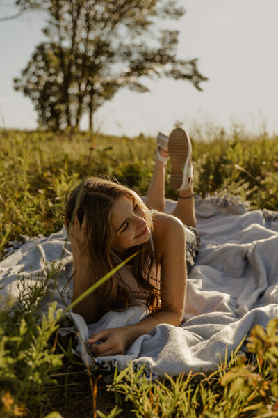 Laying Down Portrait Photo Pose in a Field of Green in Southern MN 