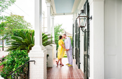 Bride and groom laughing at each other