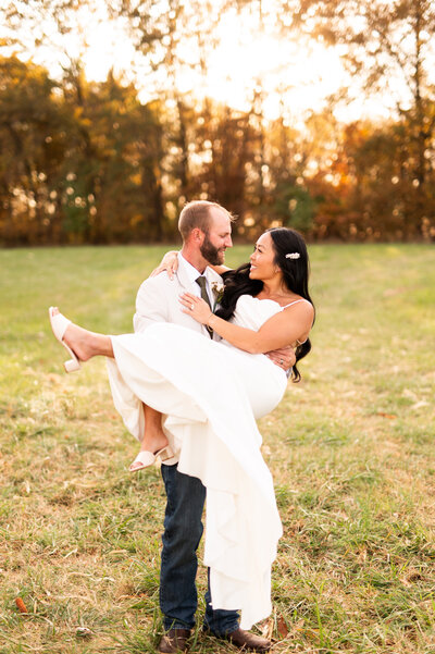 Bride and groom holding hands during their wedding