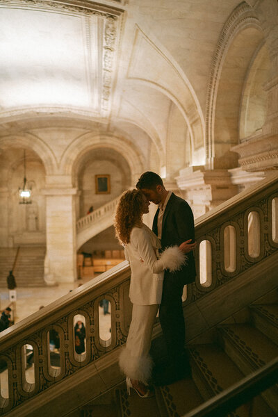 bride and groom kissing at the met during NYC elopements shot by Elsie Goodman Photography | NYC Elopement Packages