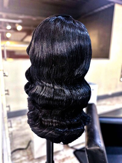 Back view of a vintage glam wave bridal wig for Las Vegas weddings, showcasing elegant flowing waves and timeless, structured style.