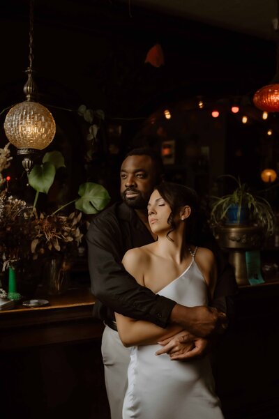 Rocky Mountain elopement with couple smiling for a Denver wedding photographer