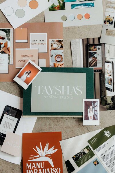 A collage of different photo prints spread out on the floor consisting of different brands, logos, photos.