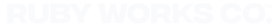 Bold, all-caps red text displaying 'Ruby Works Co.™' in a strong, modern font. This branded typography reflects the agency’s confident, strategic, and results-driven approach to branding, web design, and digital marketing for small businesses and creative professionals."