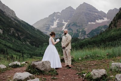 Bride and groom exchange vows in self-solemnized ceremony.