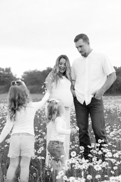 spring family photo in a field