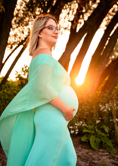 Sunset flowing dress pregnant baby bump