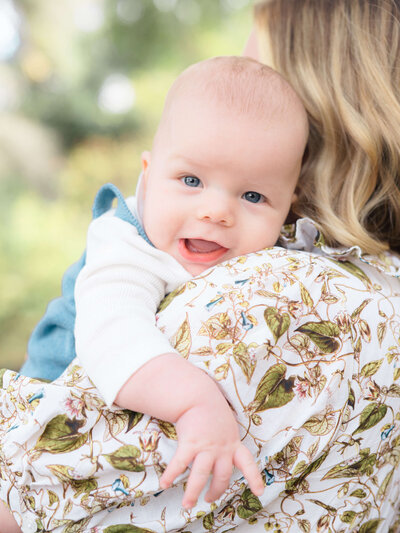 Baby smiling at the camera