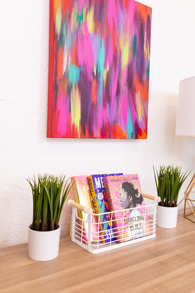 table with books and greenery
