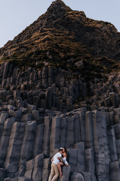 Iceland Wedding Photographer captures couple kissing on mountain