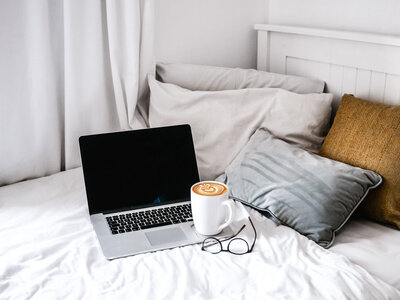 laptop on the bed