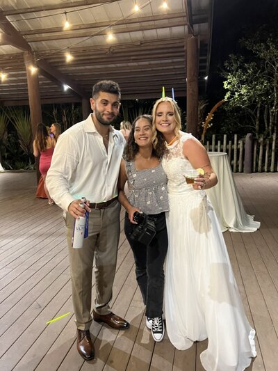 wedding photographer with wedding couple