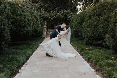 groom dips bride