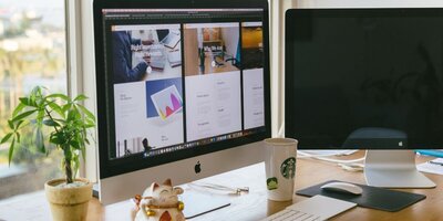 Mac Desktop and teacup at Selin Marketing
