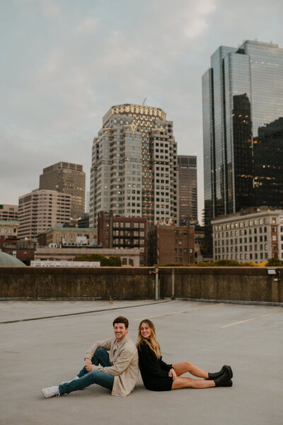 couple in front of boston city skyline