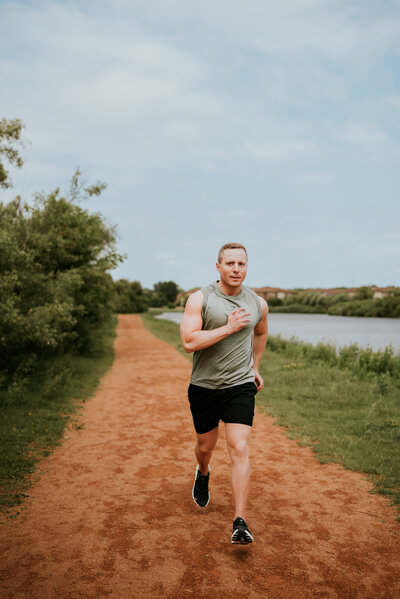 A man in athletic wear running to show his passion for working out for his online dating app profile