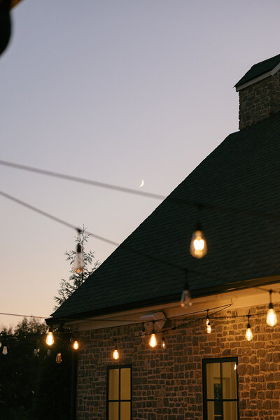 Warm image of outdoor string lights taken by Through Victoria's Lens