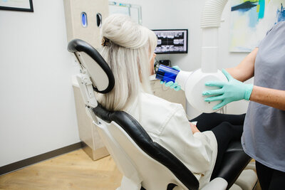 Prosthodontist taking an x-ray at Peak Prosthodontics’ to create a personalized TMJ disorder treatment approach.