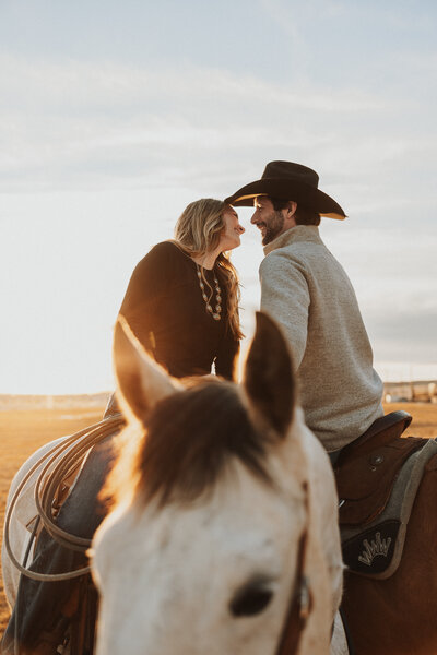 romantic couple on horses in nebraska