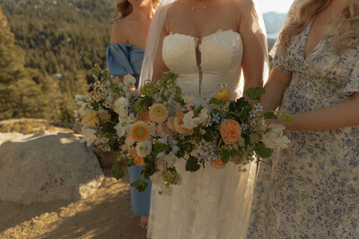 Bride and Bridesmaids holding their bouqet