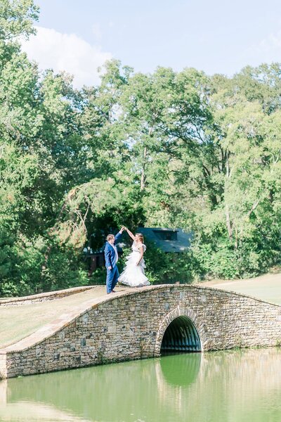 Couple on Bridge at Country Club of Columbus by Georgia Wedding Photographer Amanda Horne