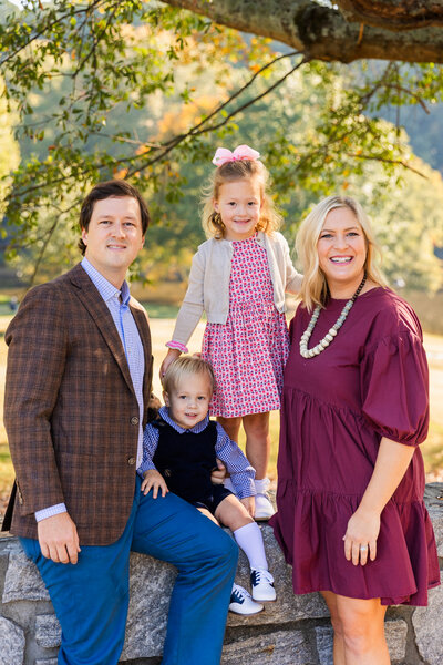 parents with toddlers boy and girl in Atlanta park during photoshoot