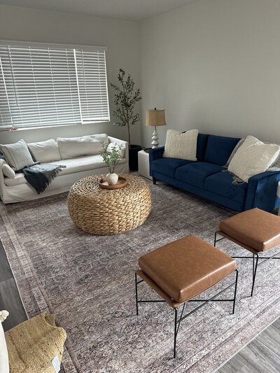 Light-filled living room styled by Kaitlyn Schultz Creative with neutral furniture and natural materials.